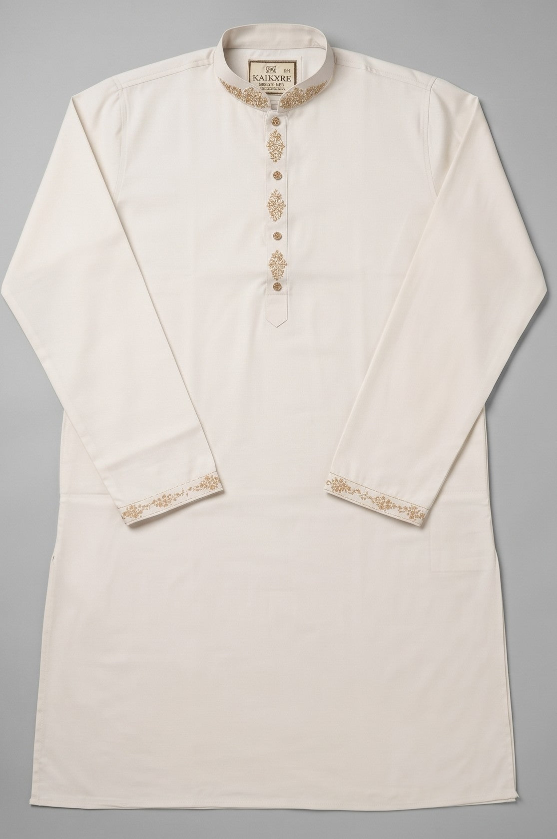 An off-white cotton kurta with gold embroidery on the collar, placket, and cuffs, laid flat against a dark background.